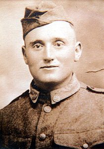 Sepia portrait of soldier in period uniform