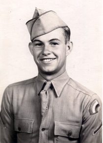 Portrait of smiling serviceman in vintage uniform