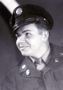 Young smiling soldier in vintage military uniform