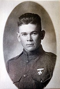 Young soldier in uniform with medal
