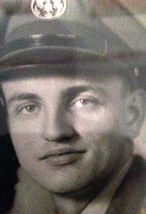 Vintage portrait of soldier wearing uniform cap
