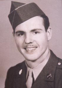 Vintage soldier portrait wearing uniform and cap