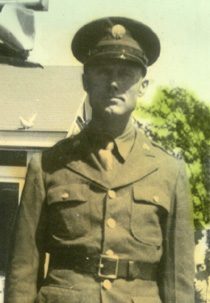 Man in vintage military uniform standing outdoors