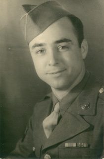 Young soldier portrait in vintage military uniform