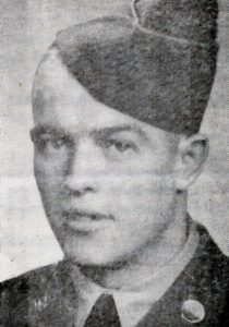Young soldier portrait wearing uniform and garrison cap
