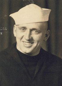 Smiling sailor in vintage white hat